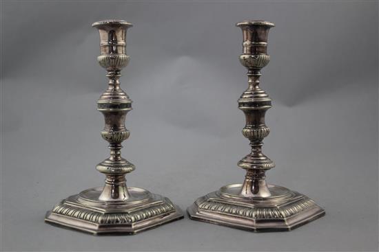 A pair of plated candlesticks, in George II style, 16.5cm.